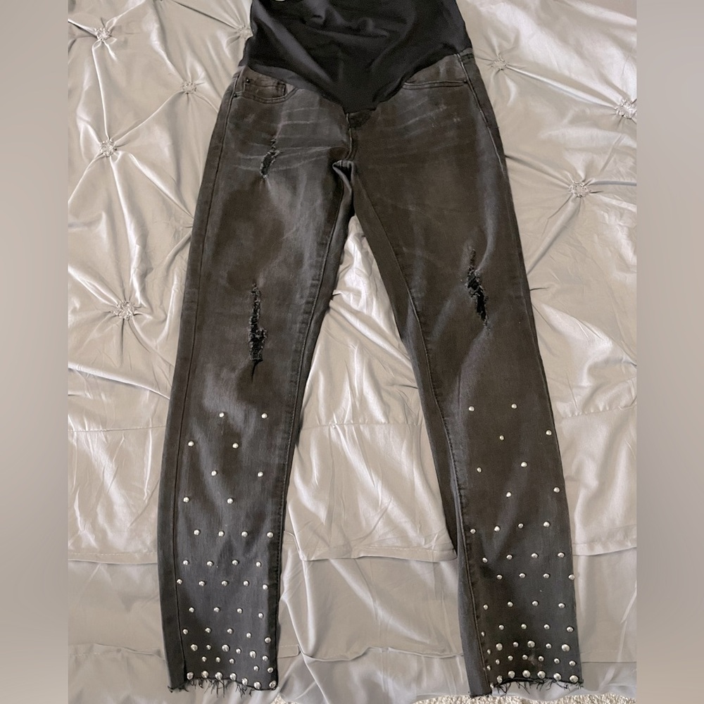 Raw hem • Studded • Slightly distressed • Black maternity jean